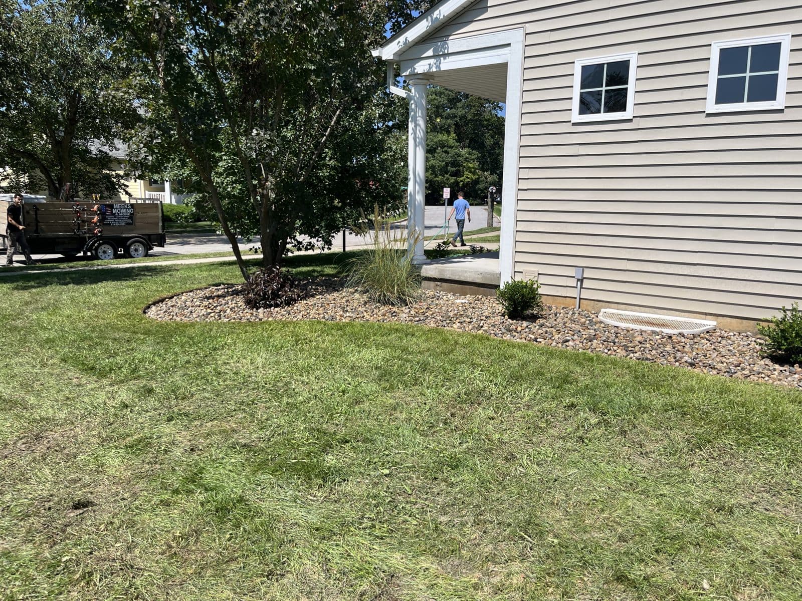 Foundation rock bed with fresh shrubs